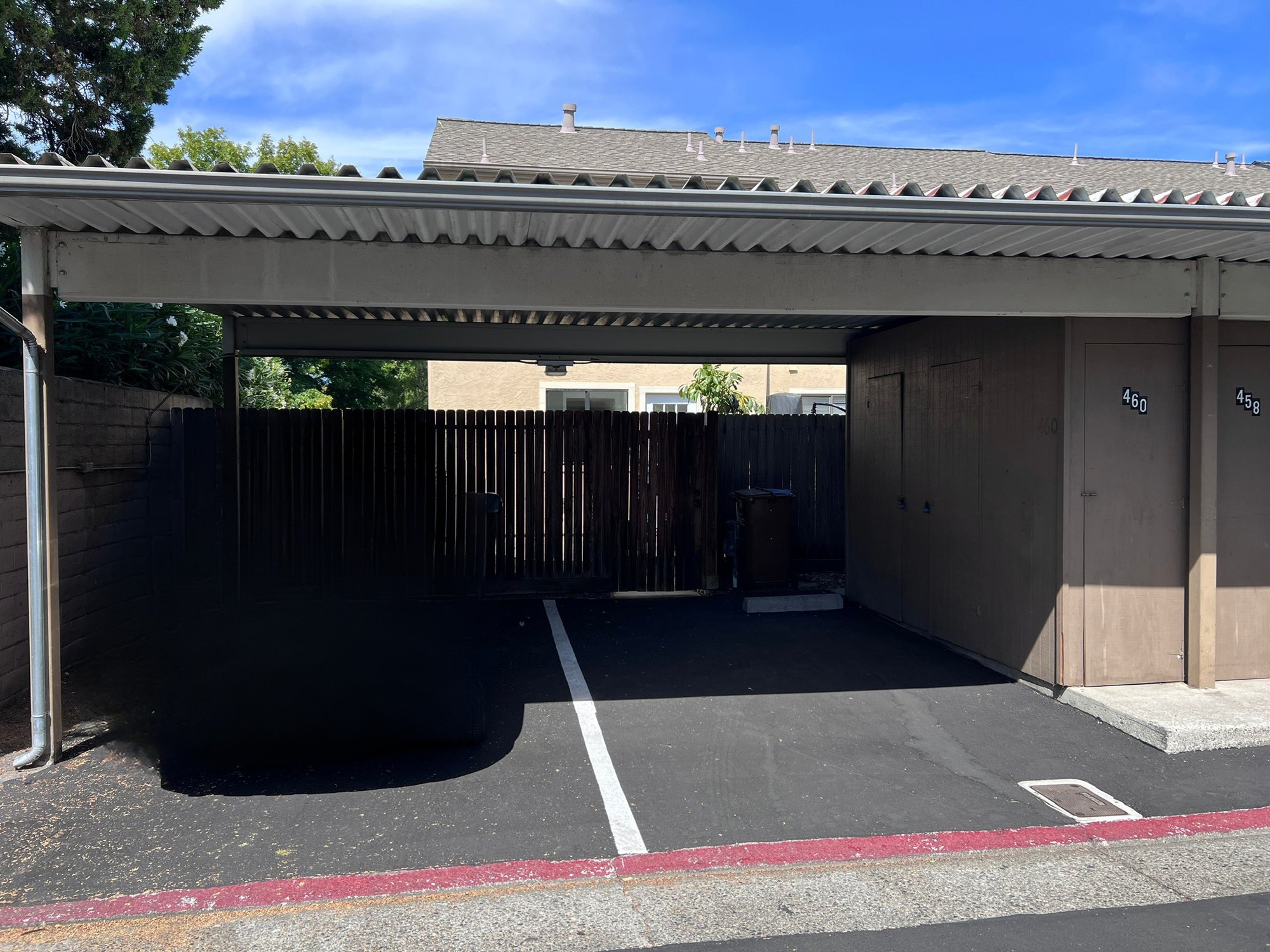 Two covered carport spaces